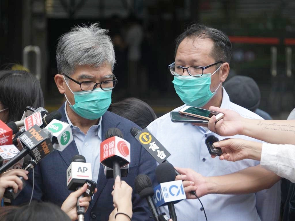 民主黨單仲偕(左)及支聯會蔡耀昌(右)。