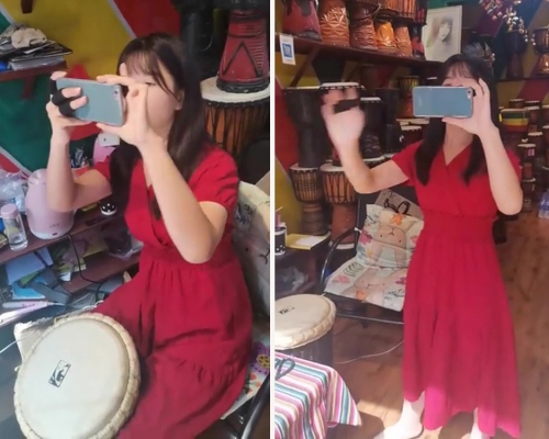 大理女店員用手機拍下遊客樣貌，又辱罵他們。（網圖）