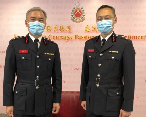 左：李建日、梁偉雄。