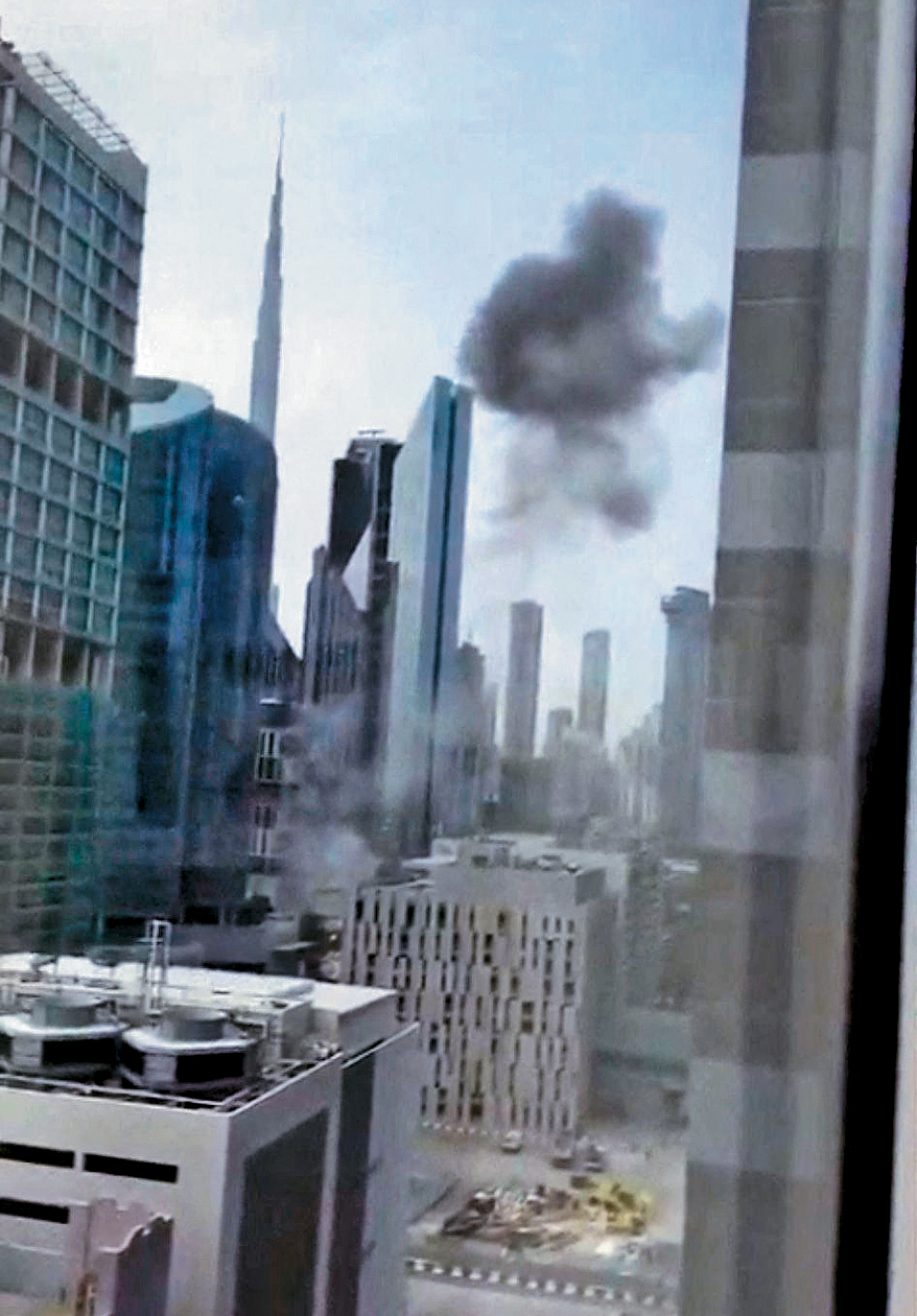 杜拜昨日攔截來襲的武器，產生的碎片對杜拜國際金融中心（DIFC）區域一棟大樓的外牆造成損壞。