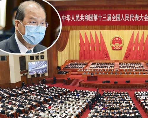 張建宗（小圖，資料圖片）指有關的《決定》無損「一國兩制」。大圖為新華社資料圖片