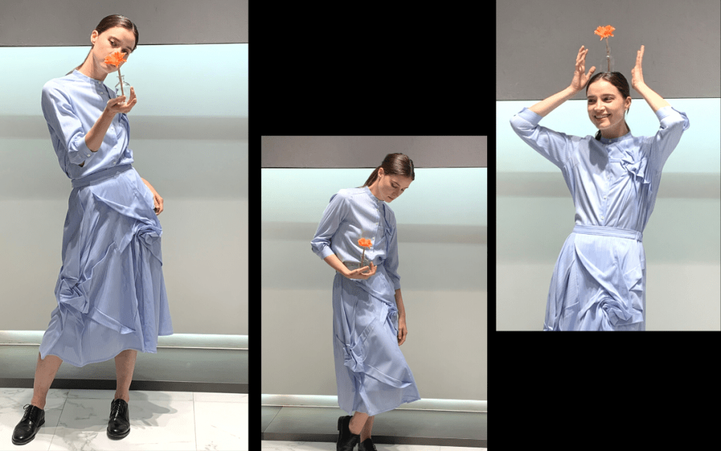将和式摺纸艺术幻化为立体剪裁细节，一向是不少日本设计师的拿手戏码。浅蓝色手工制立体花饰衬衣/$3,495 、采用同一设计的半截裙/$3,995 。