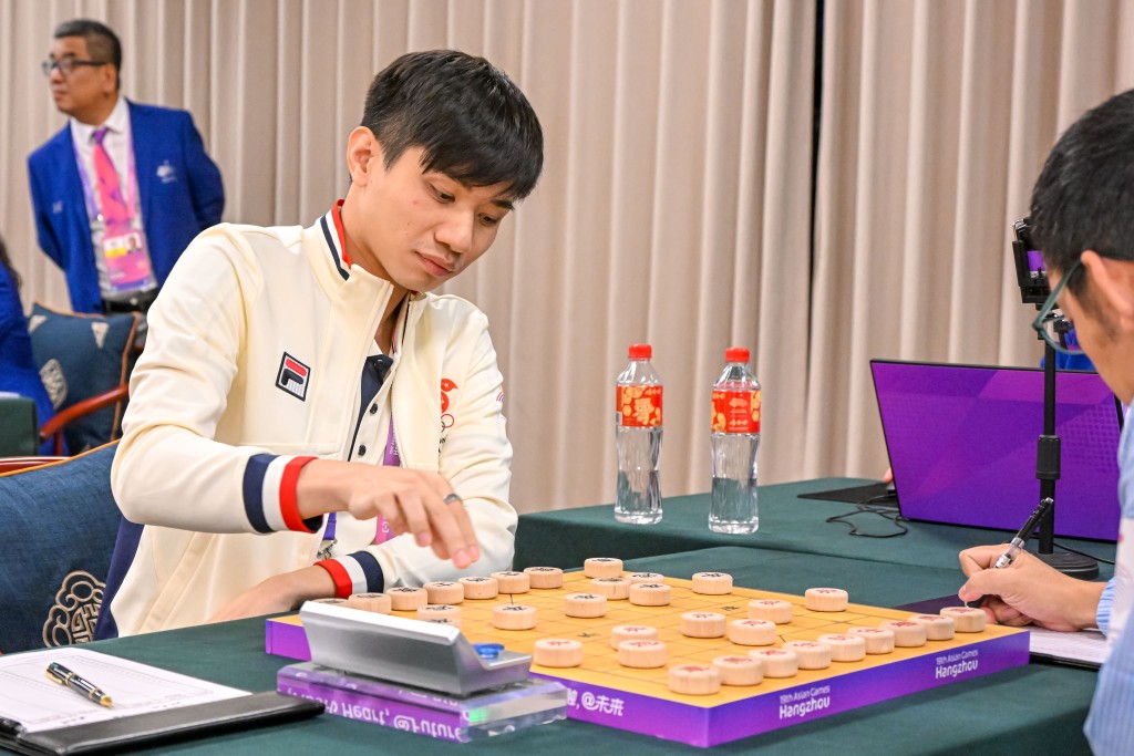 杭州亚运象棋混合团体赛，港队首夺铜牌创历史。 港协暨奥委会图片