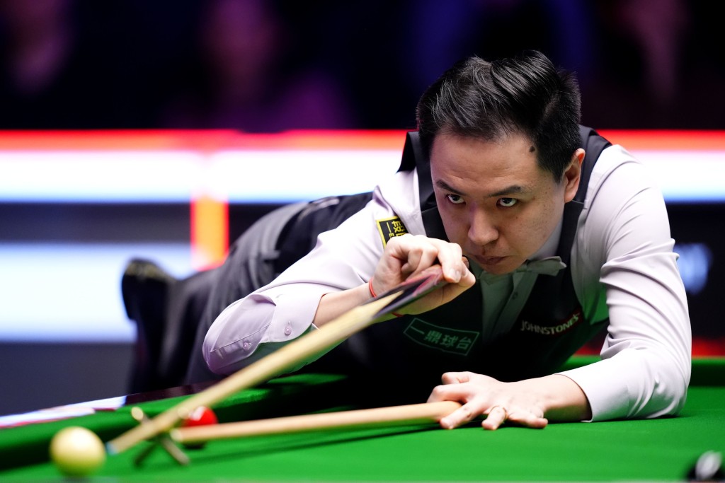 肖國棟在小組首場即打出滿分。美聯社 肖國棟在小組首場即打出滿分。美聯社