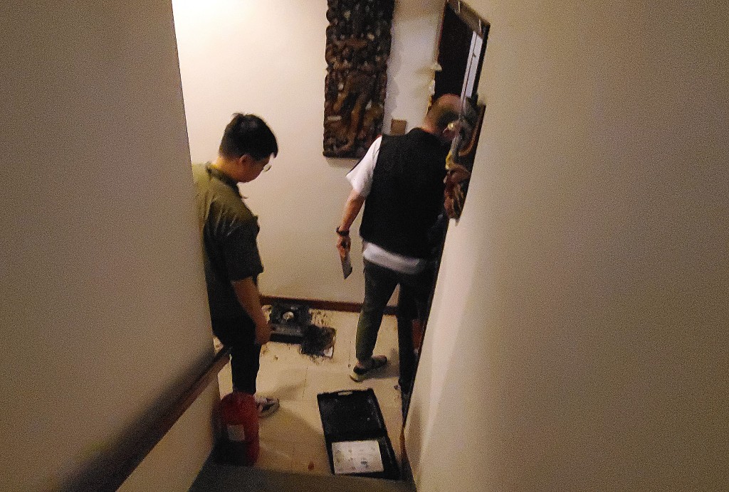 縱火案現場，警方調查。　資料圖