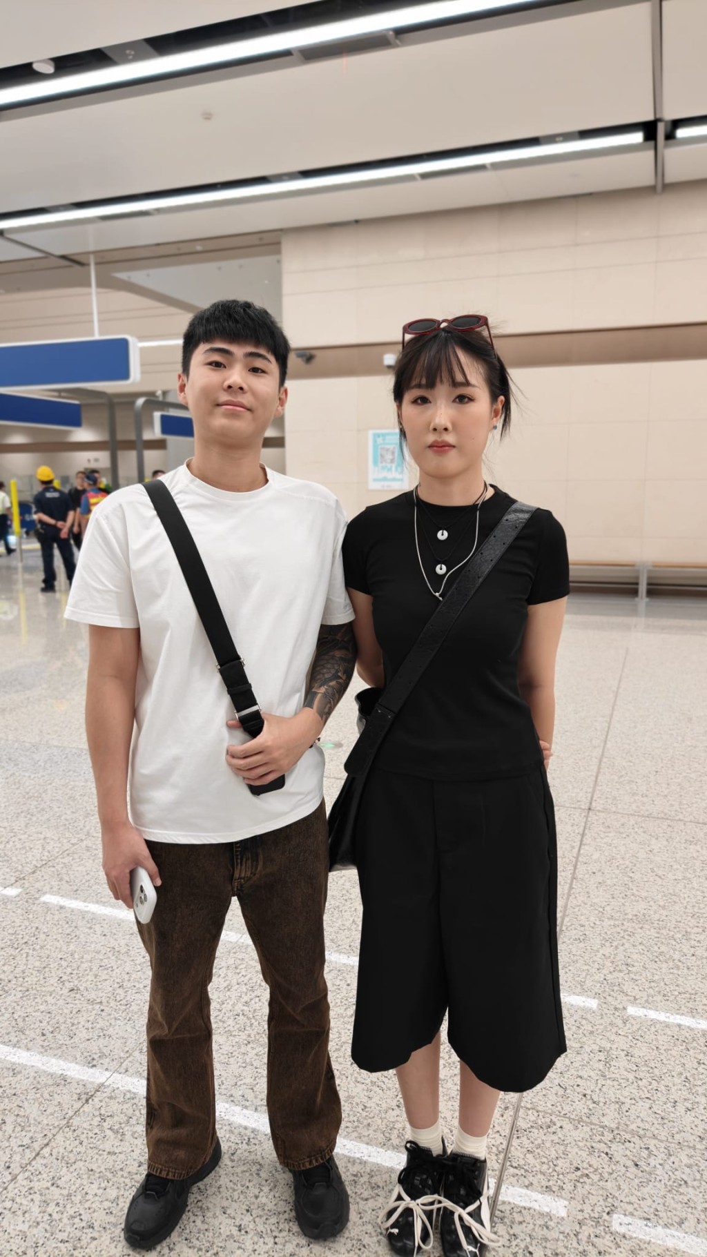 来自武汉的李先生和刘小姐打算回深圳过夜。周正豪摄 来自武汉的李先生和刘小姐打算回深圳过夜。周正豪摄