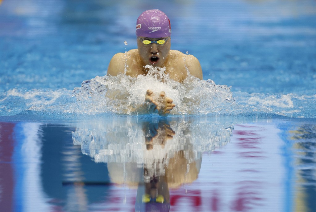 覃海洋取得中國歷來首面世錦賽男子蛙泳金牌。Reuters