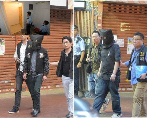 疑犯黑布蒙頭重組案情。黃文威攝