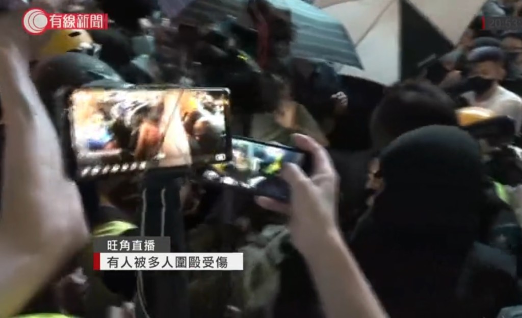 操普通話男子被圍毆。有線新聞截圖