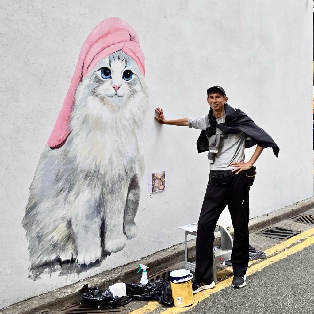 油麻地貓壁畫是由繪畫老師李學鋒繪畫。（圖片來源：Art Dreamers FB）