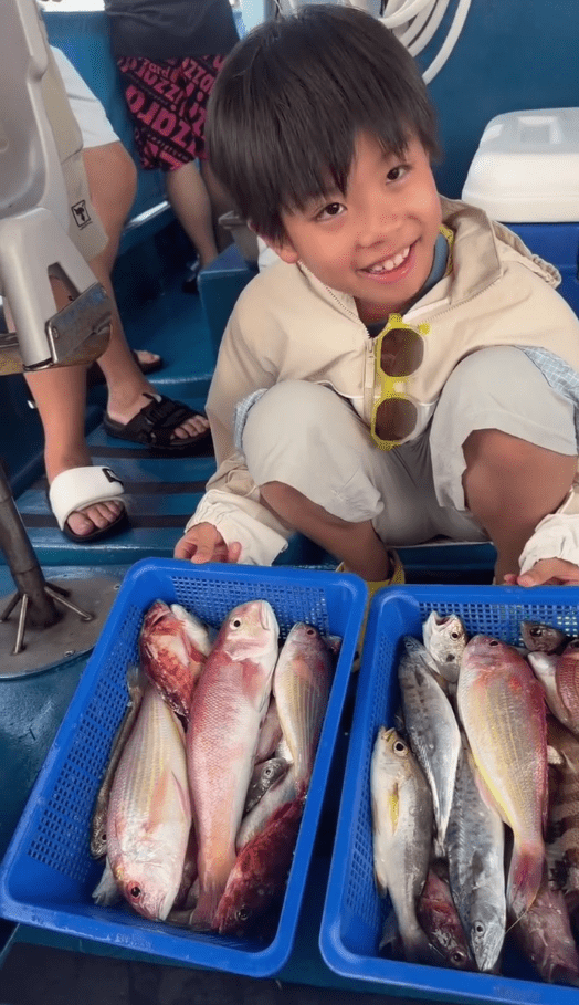 8歲的「小春雞」黎峰睿釣魚技術出色，大有斬獲。