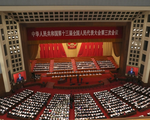 政府工作報告重申房住不炒,未提房地產稅立法。(新華社圖片)