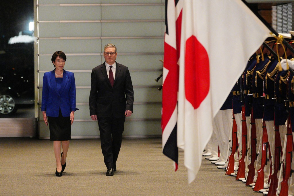 兩國領袖會面約20分鐘，討論加強貿易與安全關係。路透社