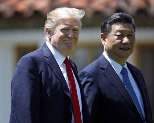 美國總統特朗普(左)、中國國家主席習近平(右)。AP