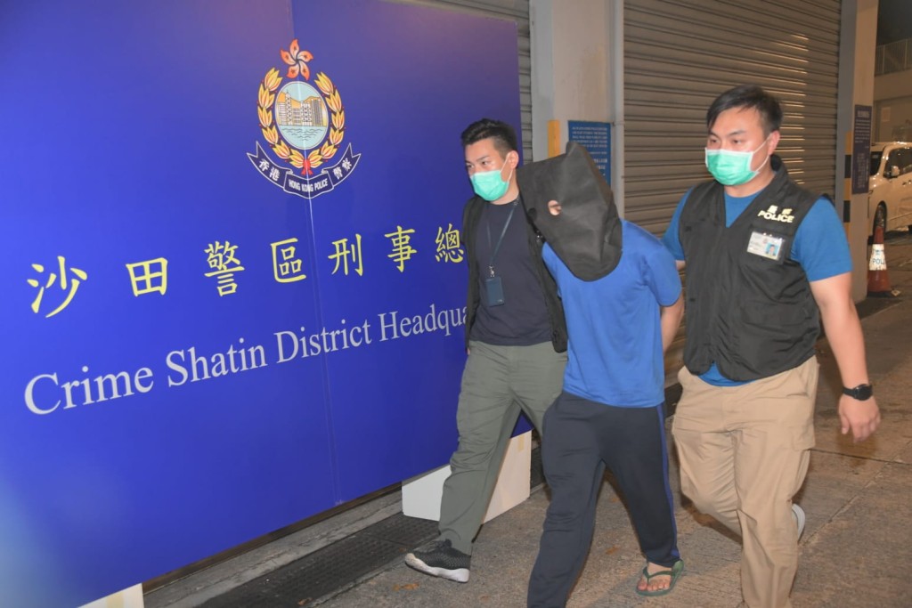 警方拘捕疑犯。