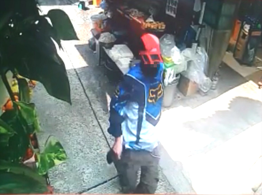 疑犯逃離現場。雲咸街排檔花店提供