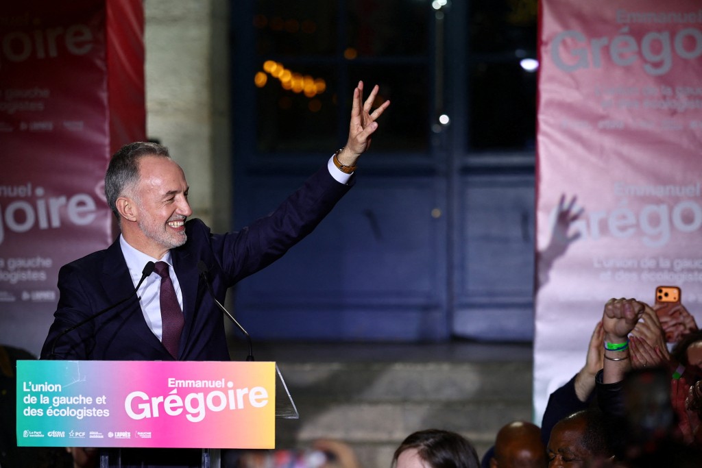 格雷瓜爾後向支持者揮手致意。路透社