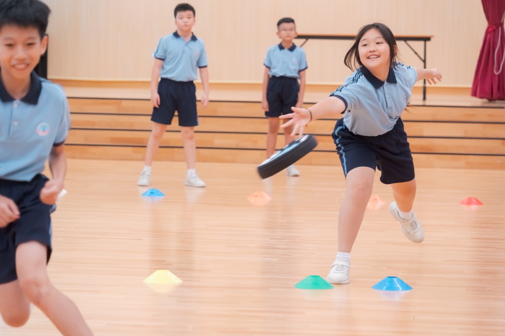 學生參與躲避盤活動，提升身體的敏捷度。（圖片來源：受訪者提供）