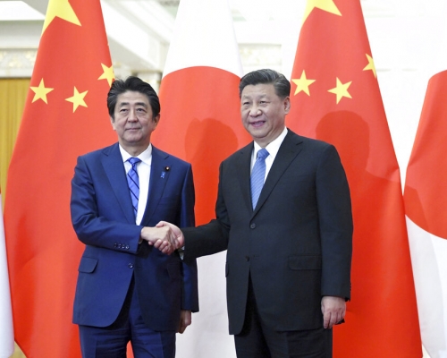 習近平會見安倍晉三。AP