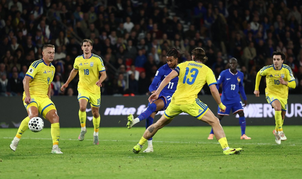 米高奧利斯為法國射成2：0。路透社