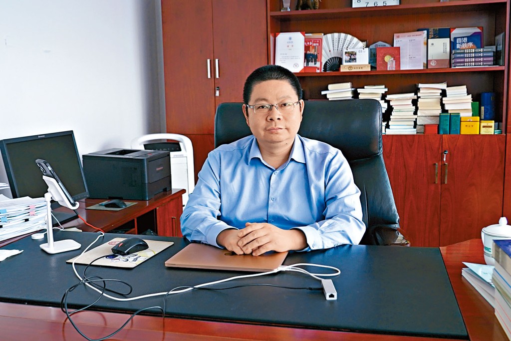 田飛龍稱，港澳「一國兩制」已形成新階段發展的系統戰略。