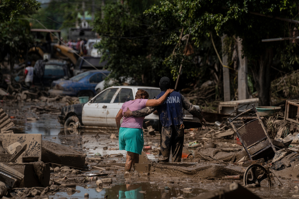 墨西哥暴雨增至少64死,仍有65人失蹤。美聯社 墨西哥暴雨增至少64死,仍有65人失蹤。美聯社