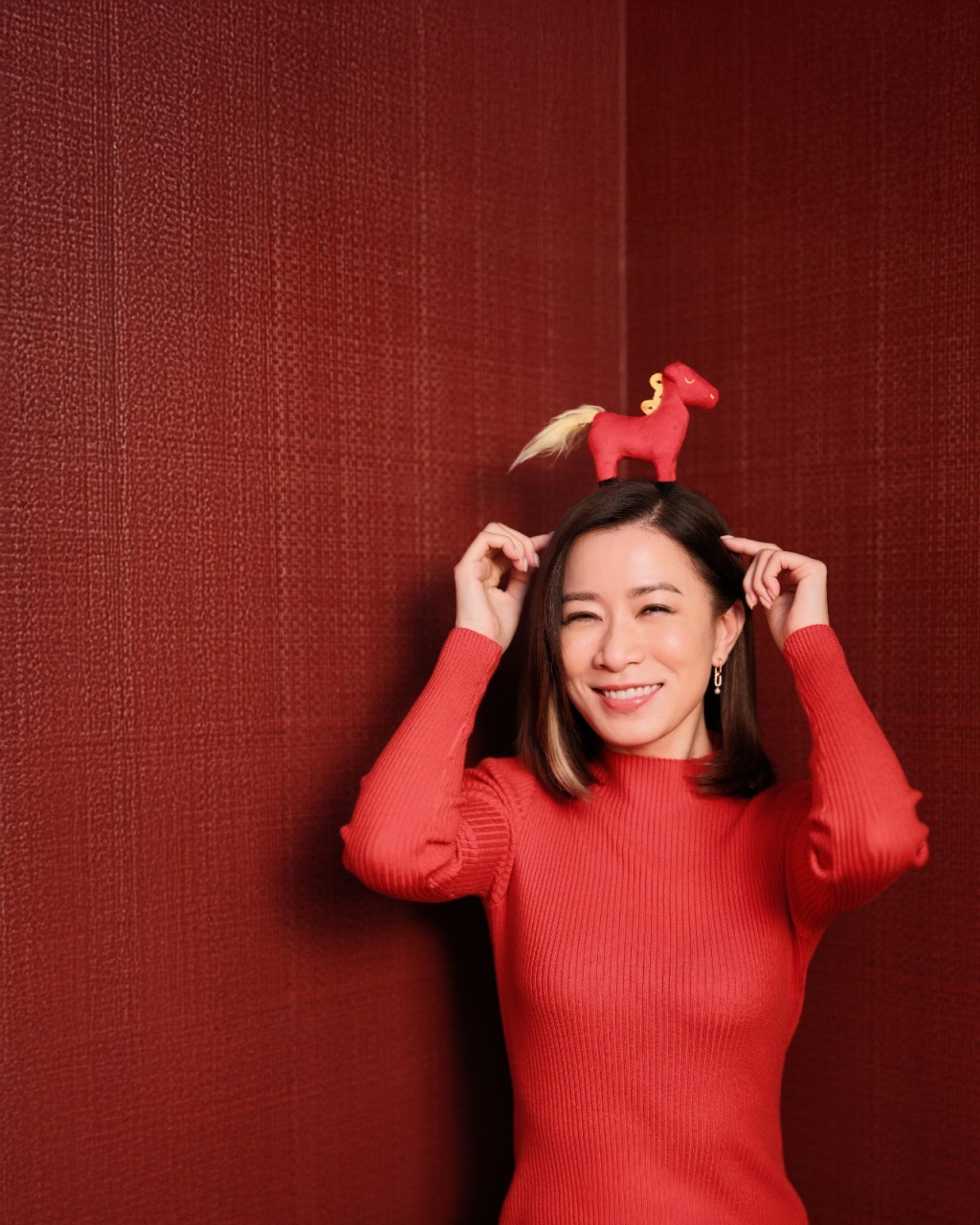 阿佘笑指農曆年喜歡到花墟揀年花。