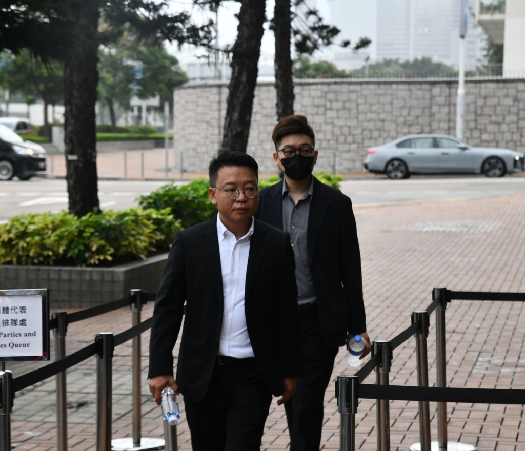 （前）宏泰消防工程董事钟杰文、（后）宏泰消防工程有限公司水喉工唐庆麟。