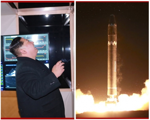 照片顯示金正恩對着一排玻璃窗抬起頭對着天空大笑。