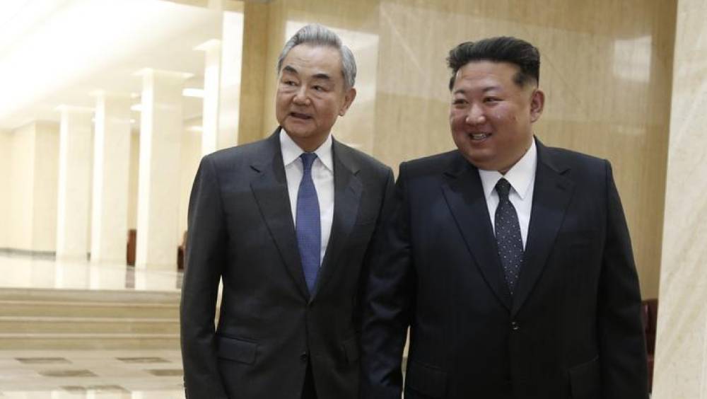 王毅晤金正恩。新華社