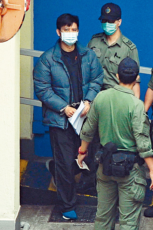 法官乃下令譚文豪（圖）及徐子見兩人須還押監房看管。