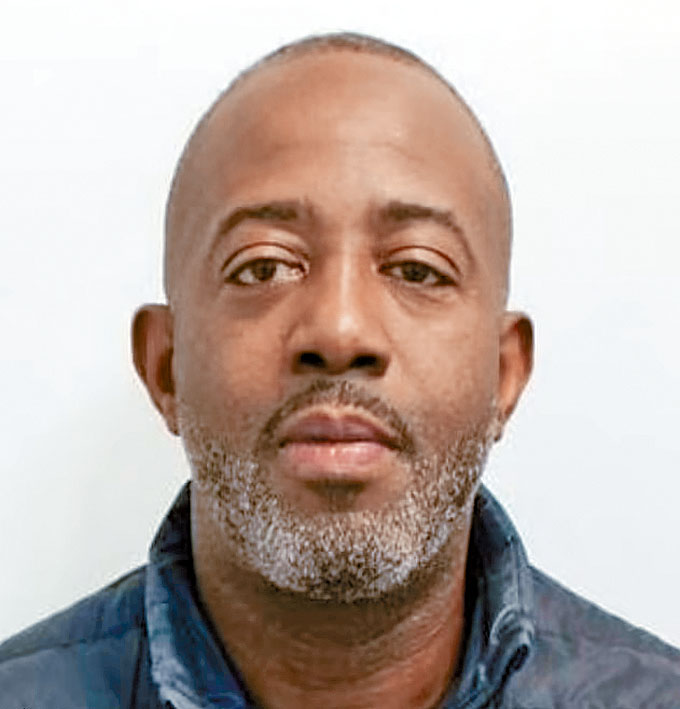 前港督彭定康的非裔女婿查爾斯。