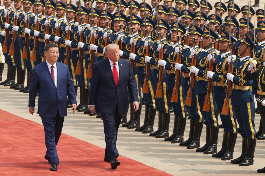 特朗普今年5月访华,获习近平款待。美联社 特朗普今年5月访华,获习近平款待。美联社