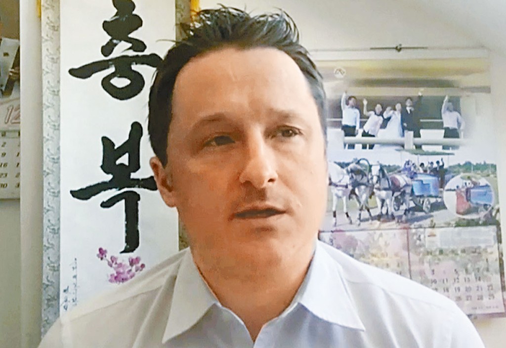 ■加拿大人邁克爾被判囚十一年。