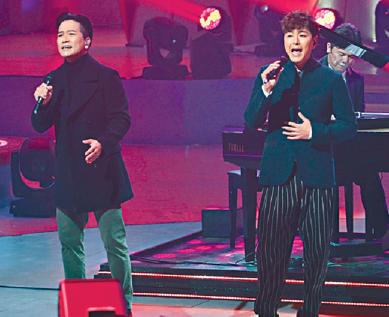 ■蕭正楠與區永權合唱。