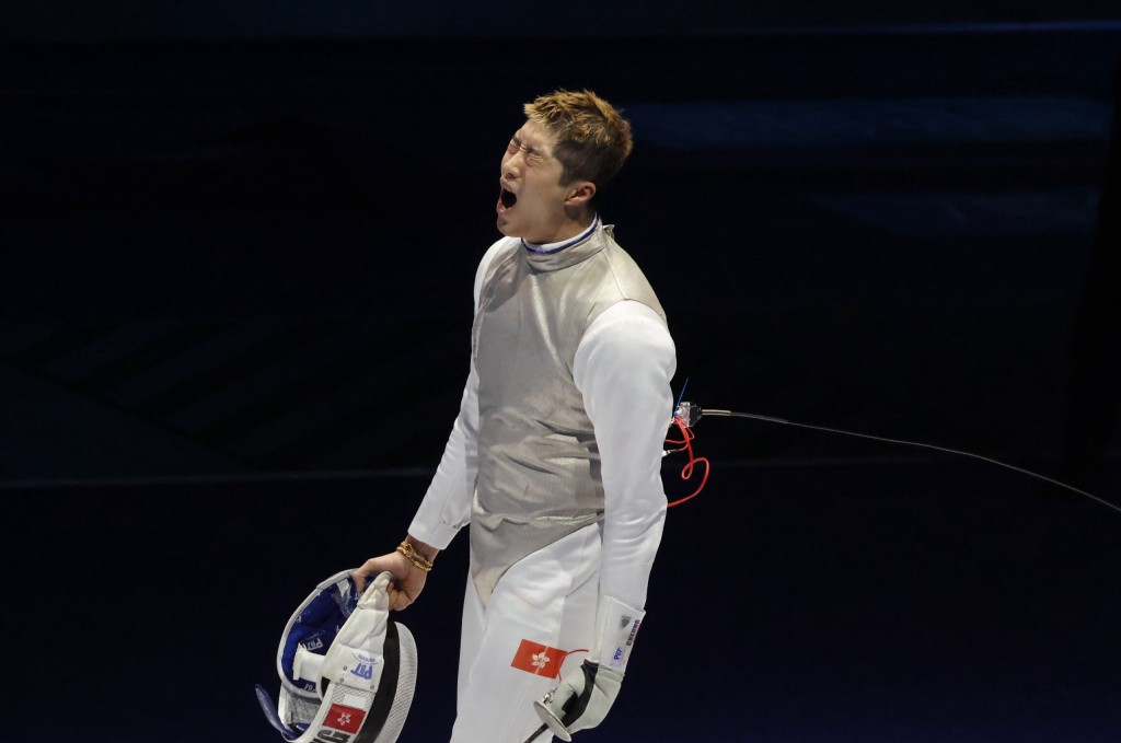 在男花團決賽，負責第一棒的張家朗取勝後激動得喊叫起來。徐嘉華攝