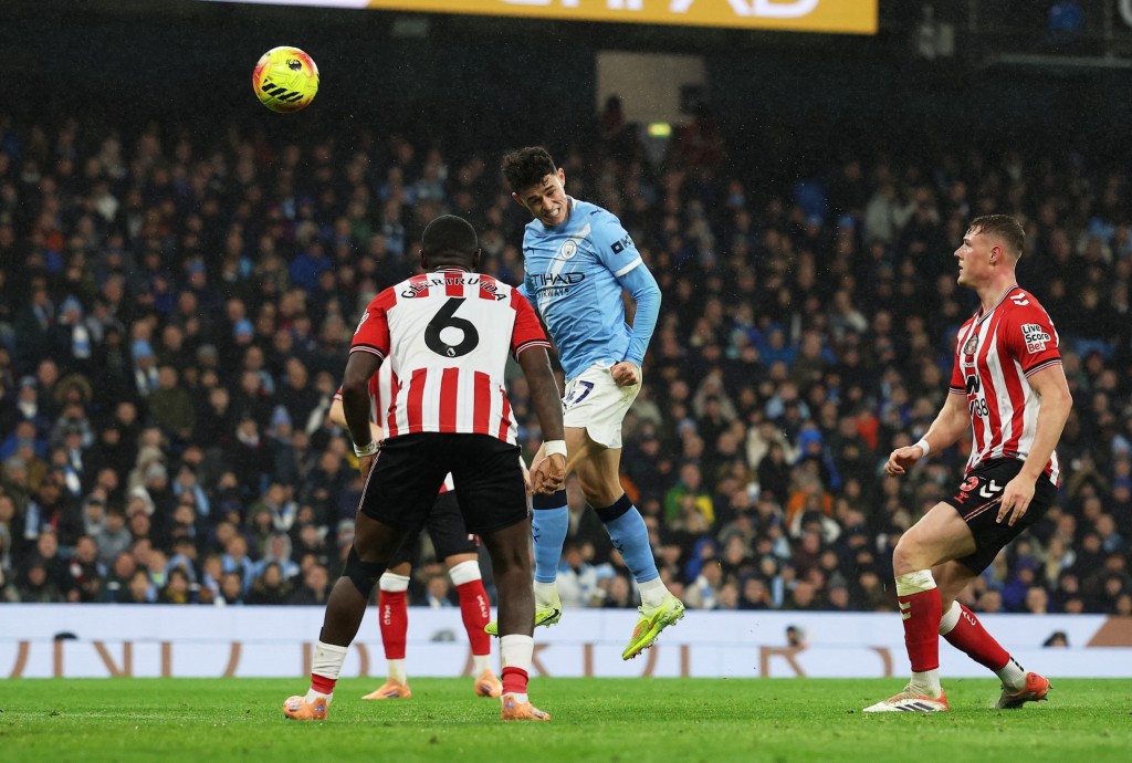 科顿接应卓基插花脚传中顶入。路透社