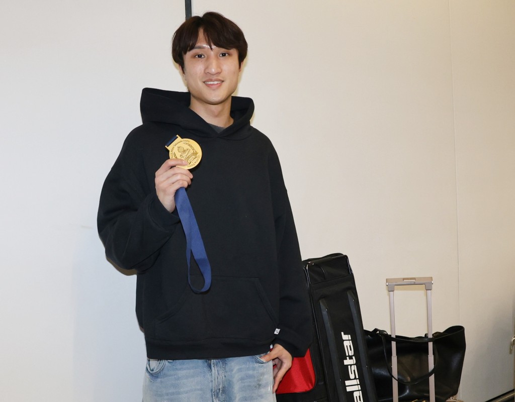 手上這面世界盃金牌給Ryan 帶來自信。徐嘉華攝 手上這面世界盃金牌給Ryan 帶來自信。徐嘉華攝