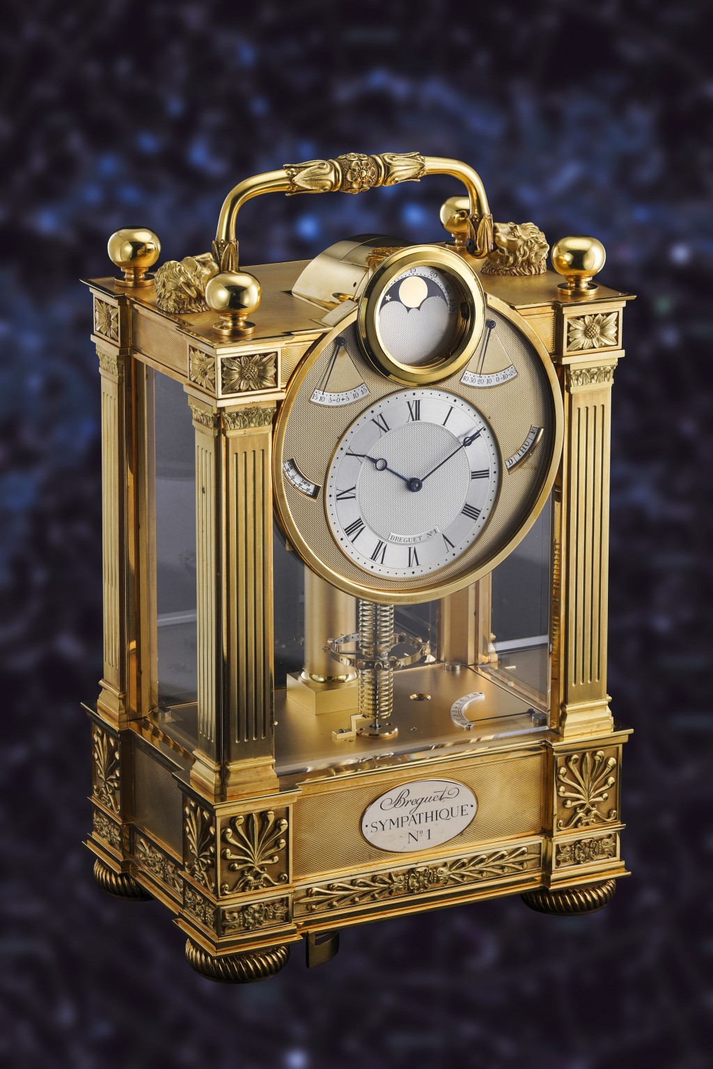 F.P. Journe × THA for Breguet,搭載獨特黃銅底座的黃金鑲板時鐘,配有帶月相顯示和動力儲存的黃金陀飛輪腕錶,1991年製。估價逾1,000,000瑞郎,成交價5,505,000瑞郎。 F.P. Journe × THA for Breguet,搭載獨特黃銅底座的黃金鑲板時鐘,配有帶月相顯示和動力儲存的黃金陀飛輪腕錶,1991年製。估價逾1,000,000瑞郎,成交價5,505,000瑞郎。