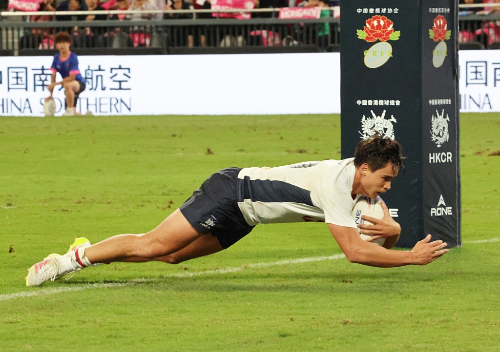 于力仁成功達陣後,令港隊從落後兩分到超前山東隊。徐嘉華攝 于力仁成功達陣後,令港隊從落後兩分到超前山東隊。徐嘉華攝