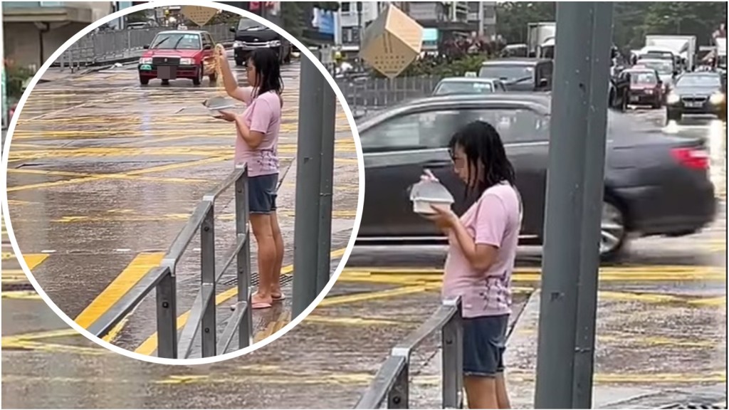 少女在雨中淡定地夾起麵條大啖嚥下。網上截圖