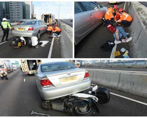 電單車與私家車相撞。 楊偉亨攝