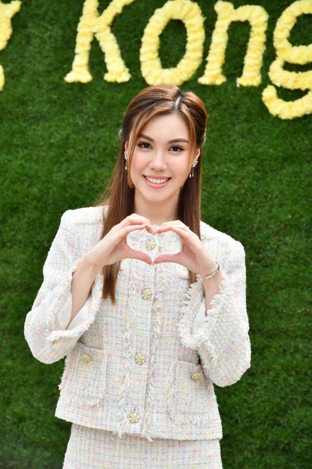 宋宛穎擔任花卉攝影比賽司儀。