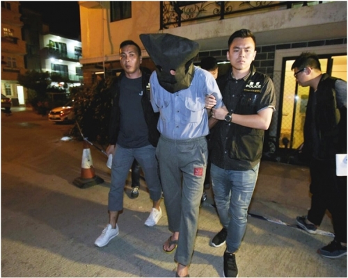 被告當日被捕情況。 資料圖片