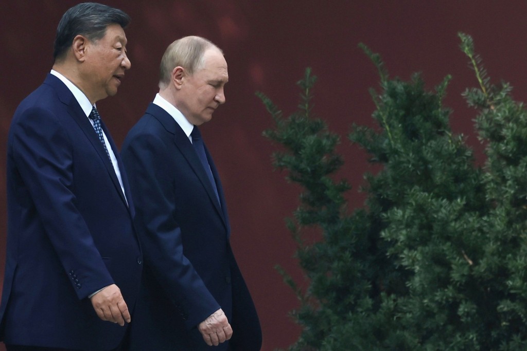習近平和普京將就雙邊關係、各領域合作以及共同關心的國際和地區問題交換意見。美聯社 習近平和普京將就雙邊關係、各領域合作以及共同關心的國際和地區問題交換意見。美聯社