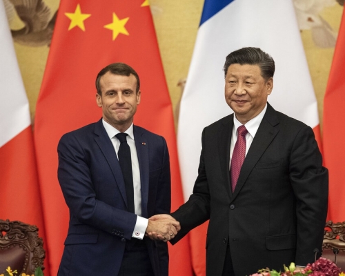 習近平會見到訪的法國總統馬克龍。AP圖片