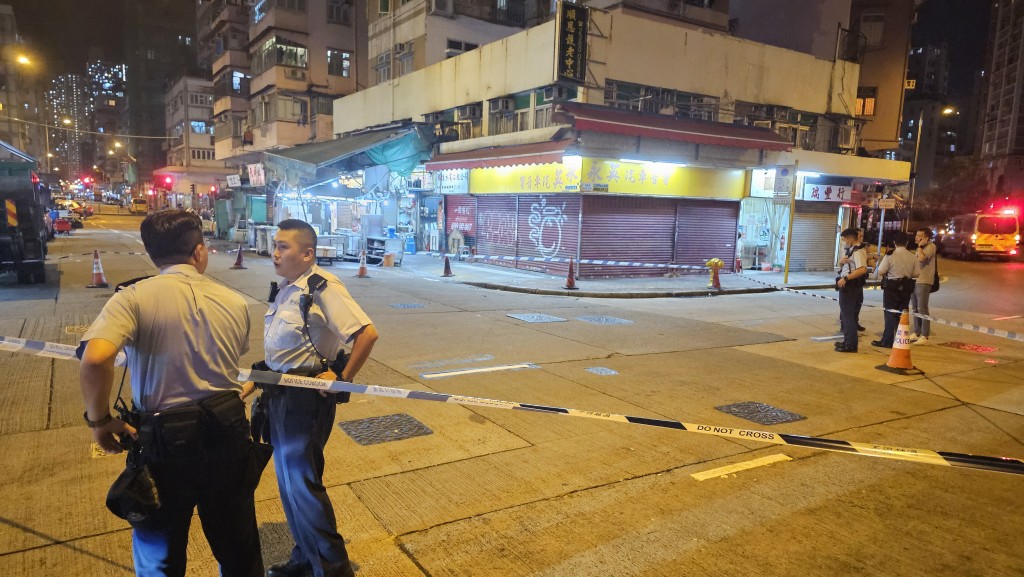 警方封锁现场一段医局街调查。徐裕民摄