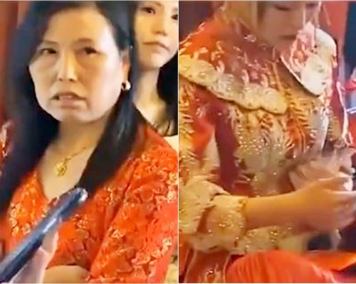 南京一名岳母不滿「開門利是」太少狂罵新郎,新娘冷眼旁觀,只顧數錢。影片截圖