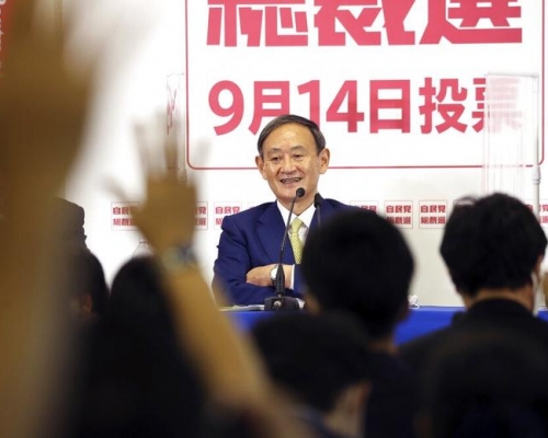 内阁官房长官菅义伟大热当选新总裁。AP资料图片