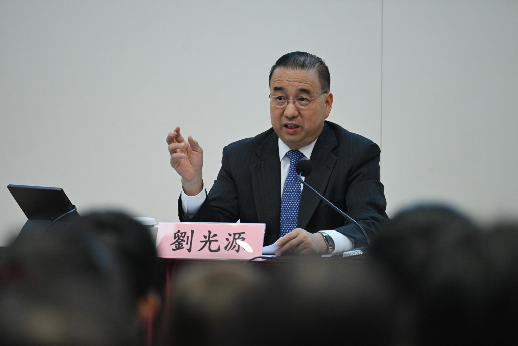 刘光源出席专题报告会，并分享国际形势和国家的外交战略。 政府新闻处图片